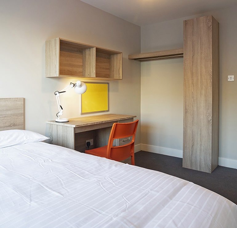 Galway Student Accommodation Apartments deluxe double bedroom with desk at Radical Edward Square