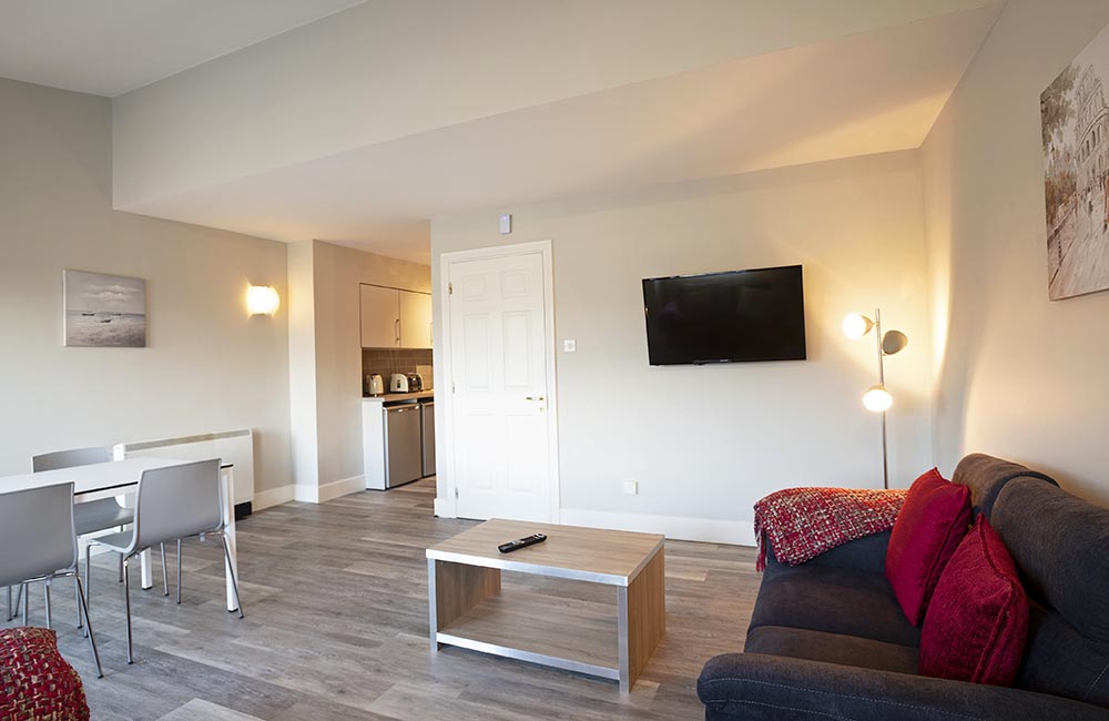Galway Student Accommodation couples Apartments living room with kitchen in Radical Edward Square